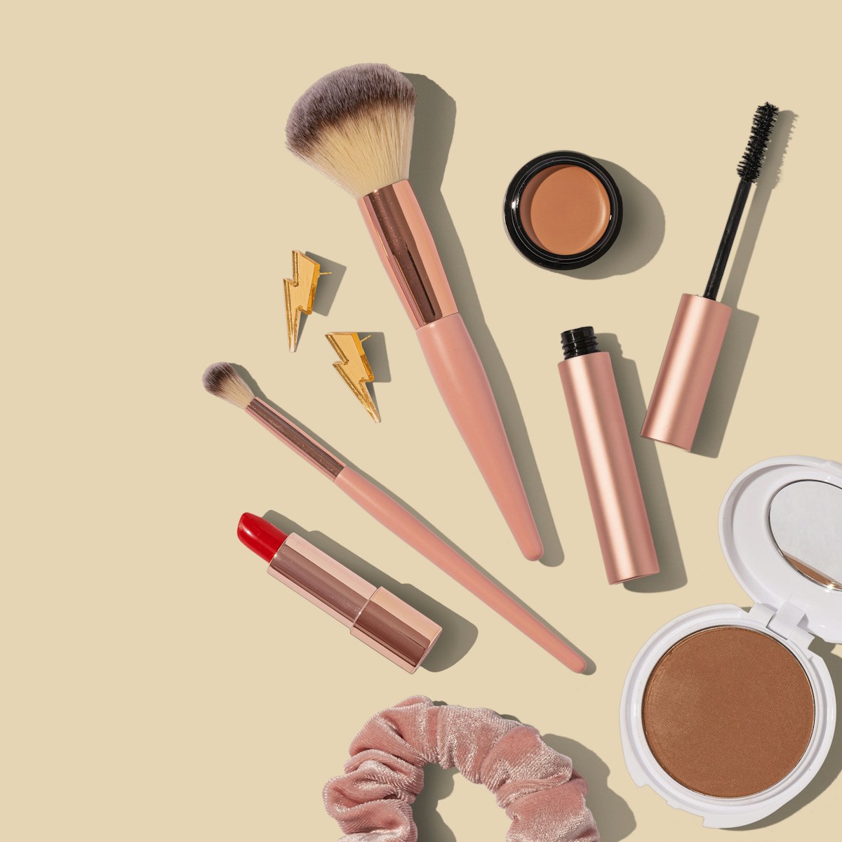 Lipsticks and beauty products in rich shades