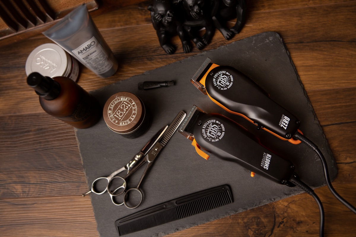 Barber giving a precise beard trim and line-up